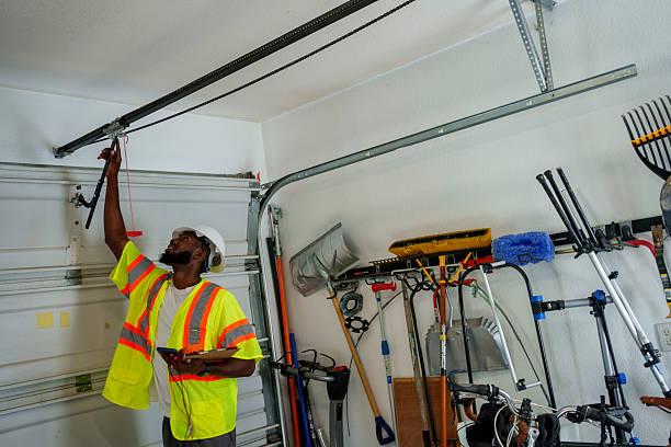 Professional Garage Door Panel Replacement technician working in Escambia County County, FL